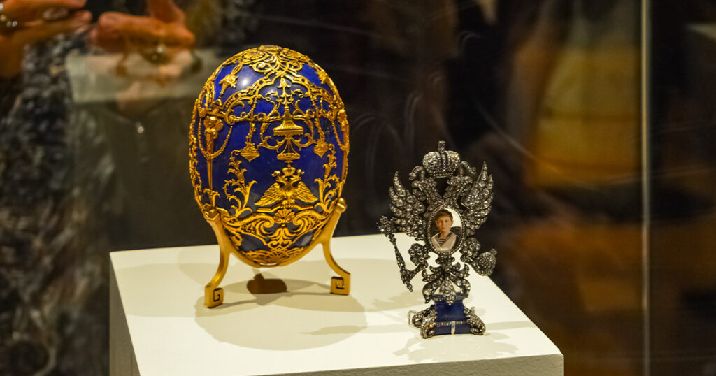 Faberge egg and a photo of a Monarch on display